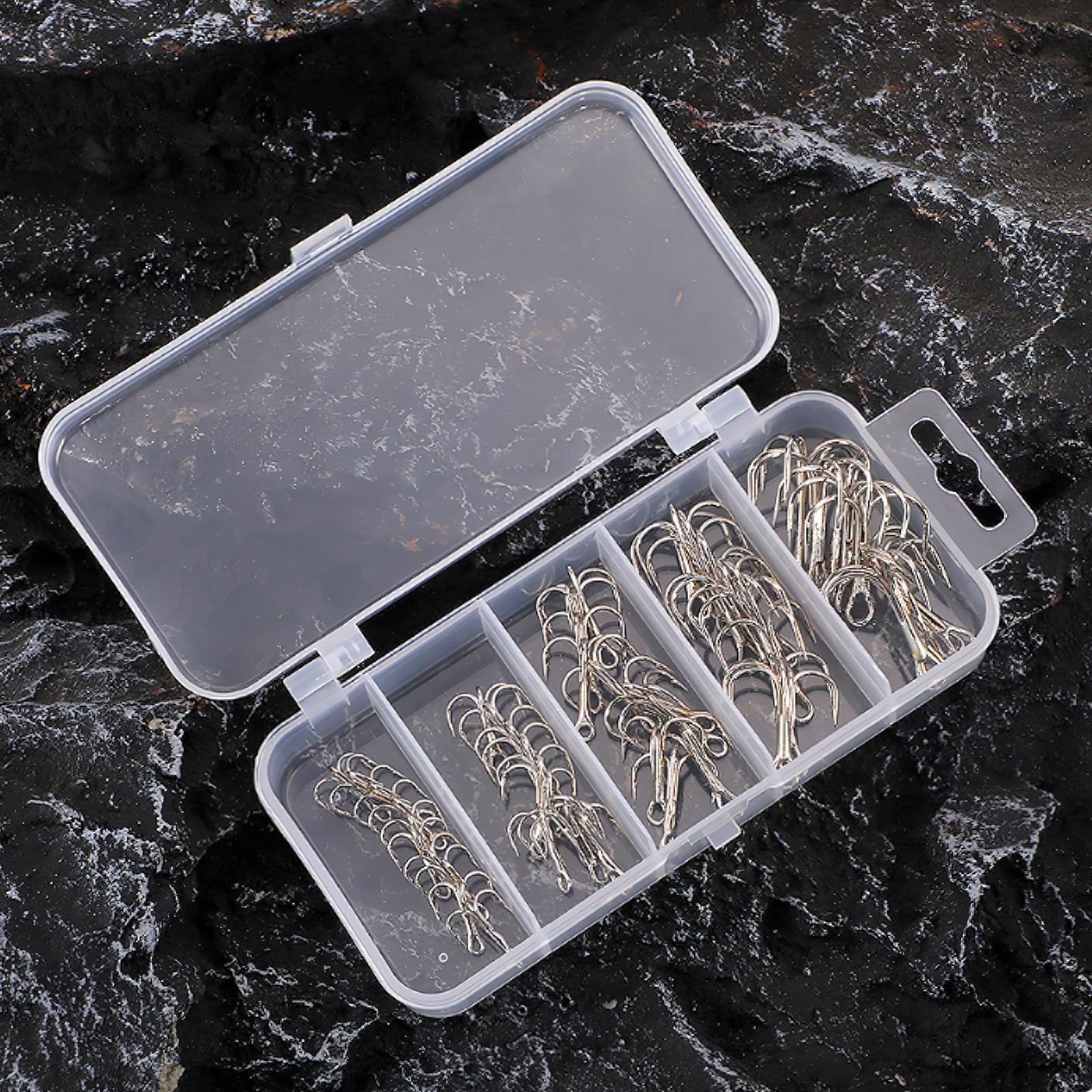 Close-up of sharp treble hook tips with barbed design
