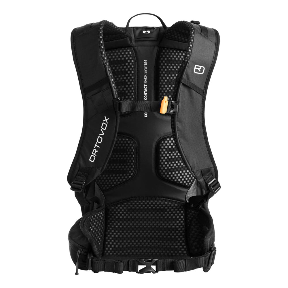 Ortovox Traverse 18L side view showing pole attachment ready for mountain routes.