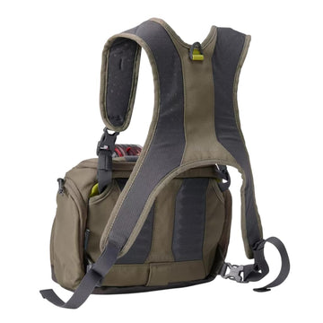 Orvis chest pack side pocket with zinger pass-through for tool reach.