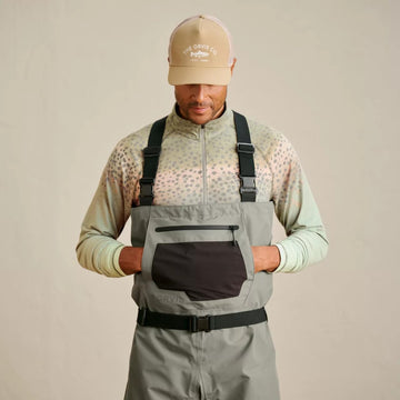 Orvis Clearwater handwarmer pocket shows warmth during cold mornings by the water.