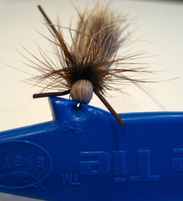 Eye Tie Threader mounted on a lanyard for easy access