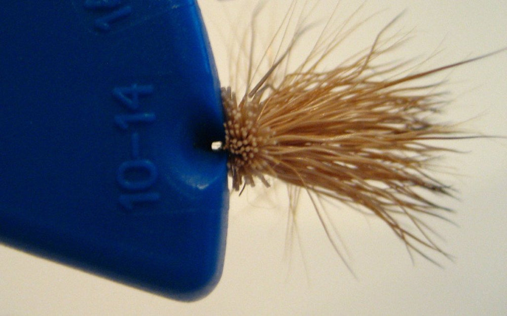 Flies held in place by magnets in the Eye Tie Threader