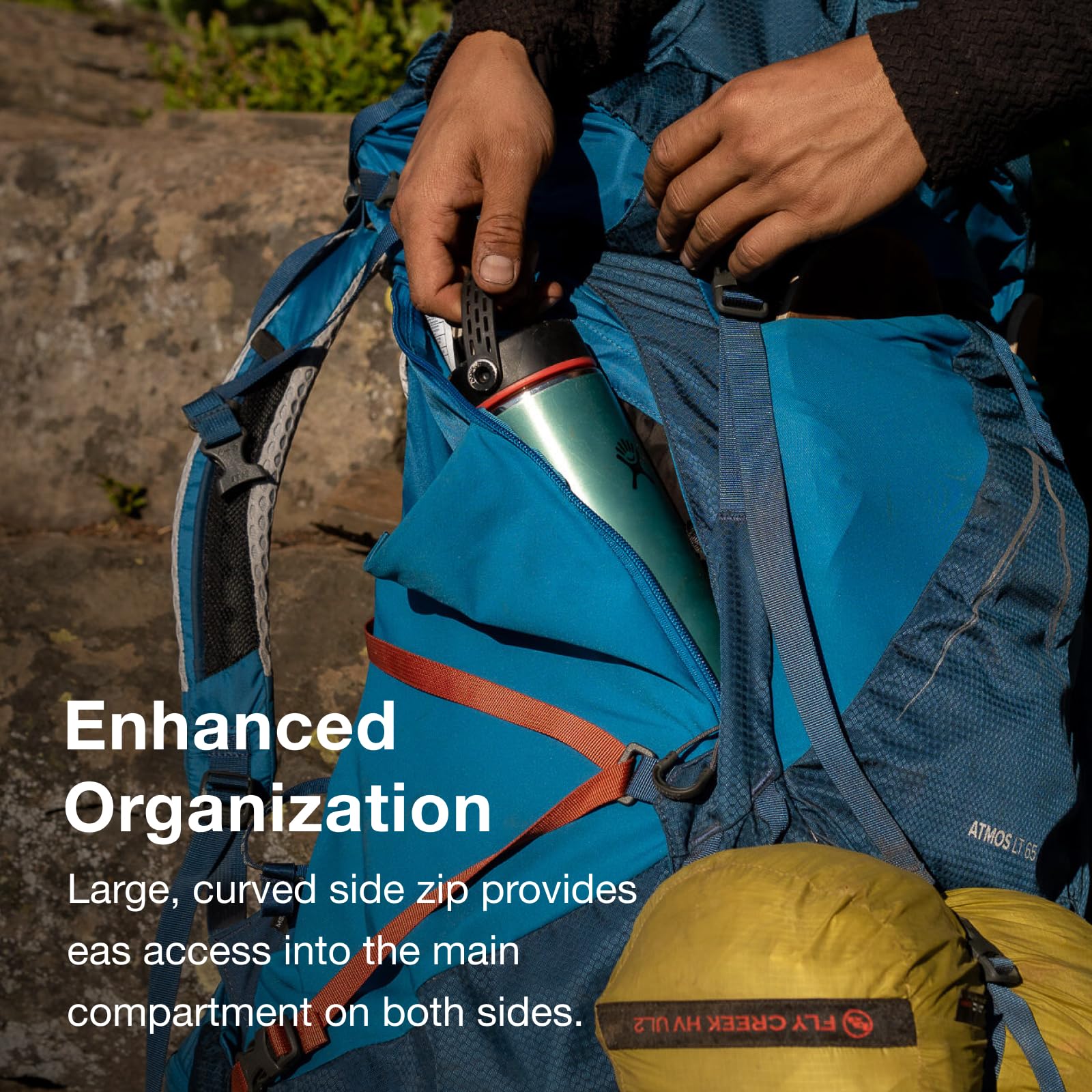 Osprey Atmos AG LT 65L hipbelt close-up demonstrates Fit-on-the-Fly adjustments for a personalized fit