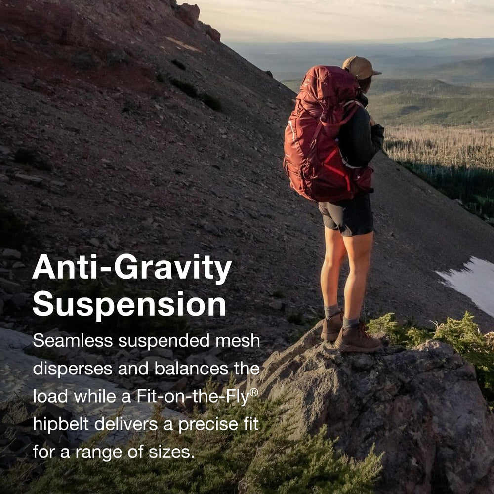 Osprey Aura AG LT 50 integrated raincover protects gear in wet weather.