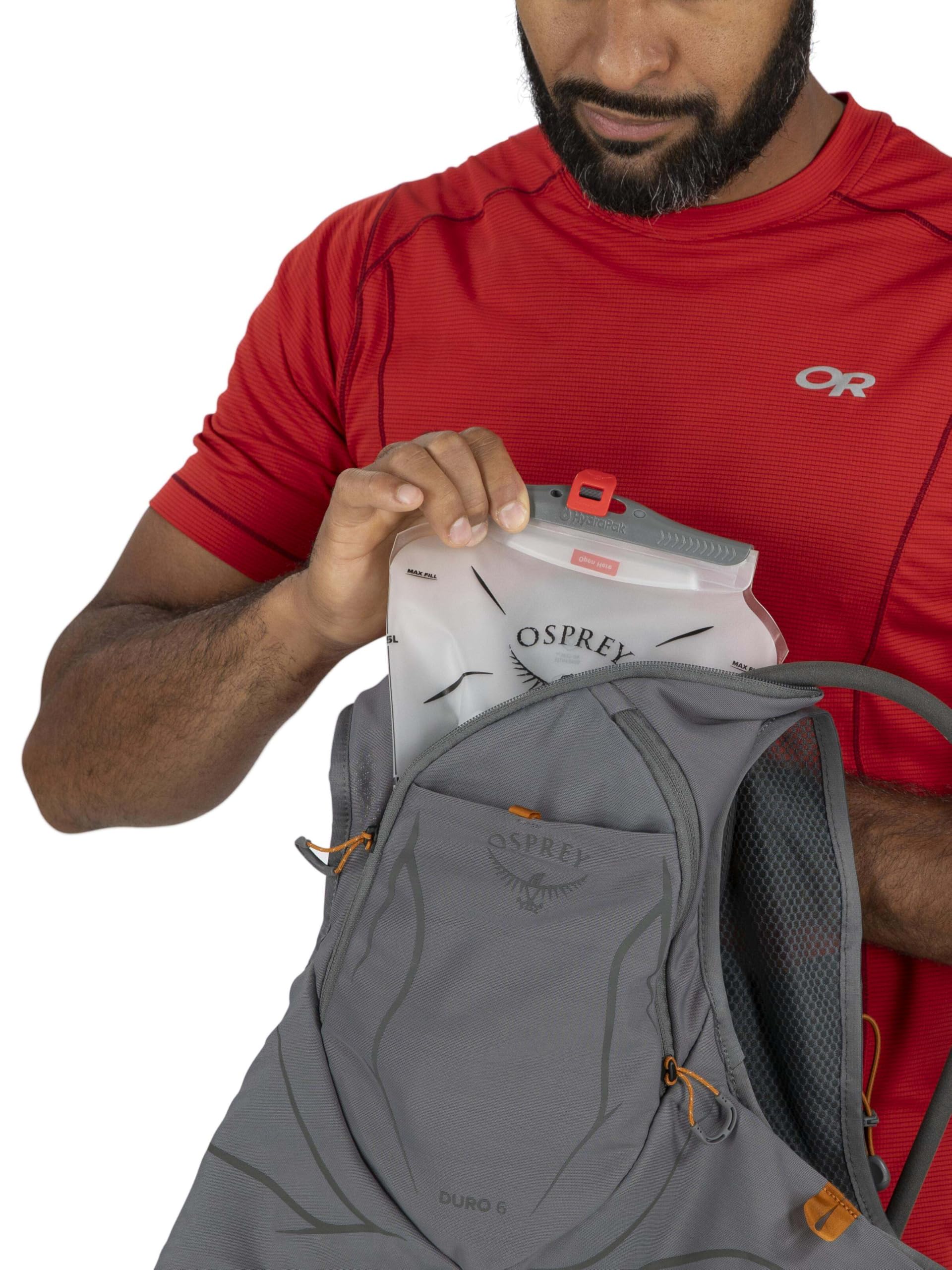 Osprey Duro 6L vest worn on a trail.
