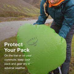 Osprey Hi-Vis raincover attached to pack on rainy street