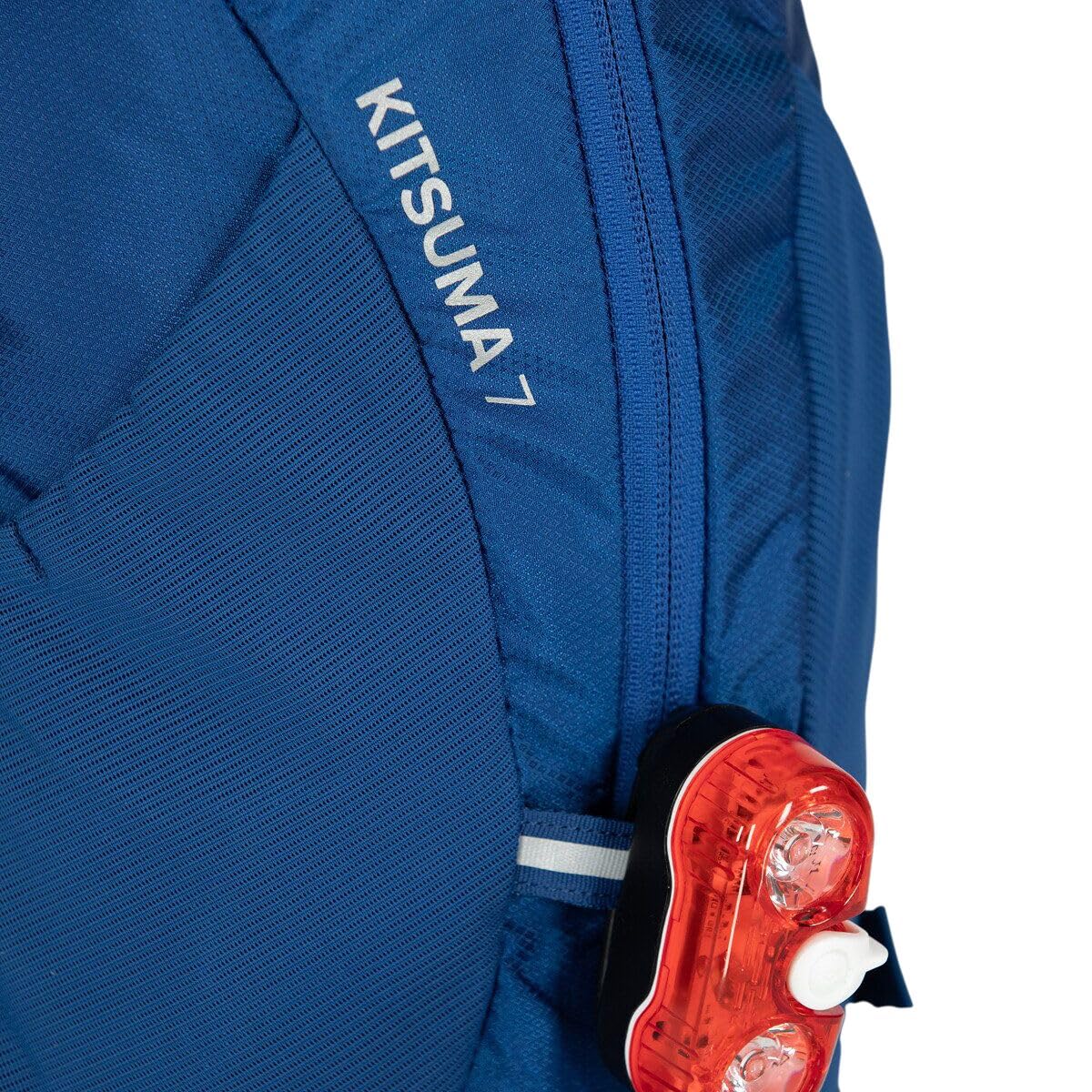 Osprey Kitsuma dual-stretch side pockets keep snacks within reach.