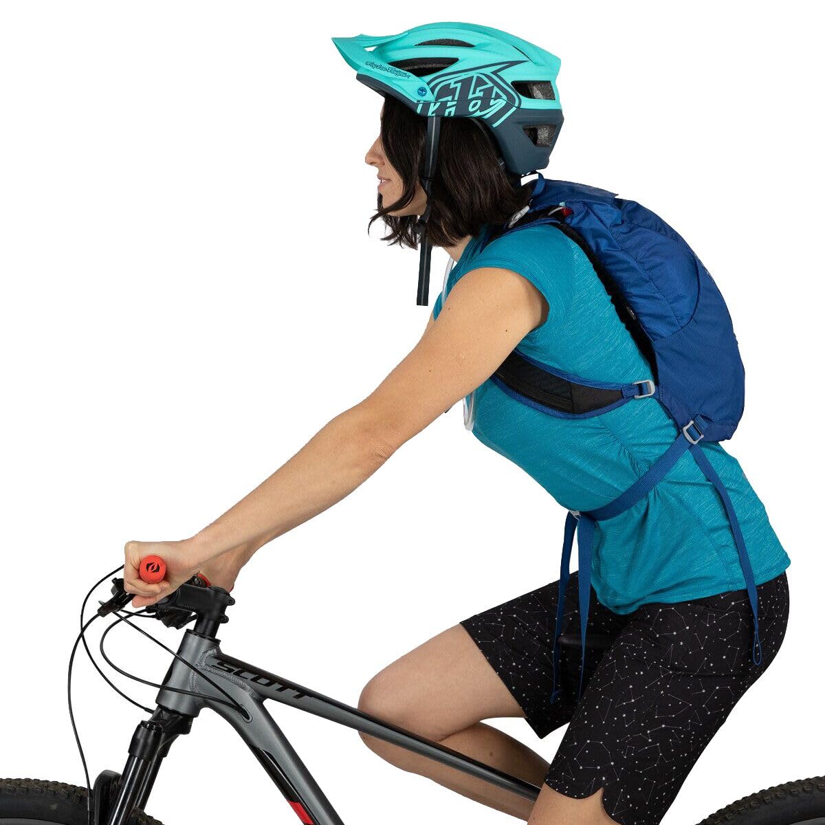 Osprey Kitsuma low-profile design reduces bulk during rides.