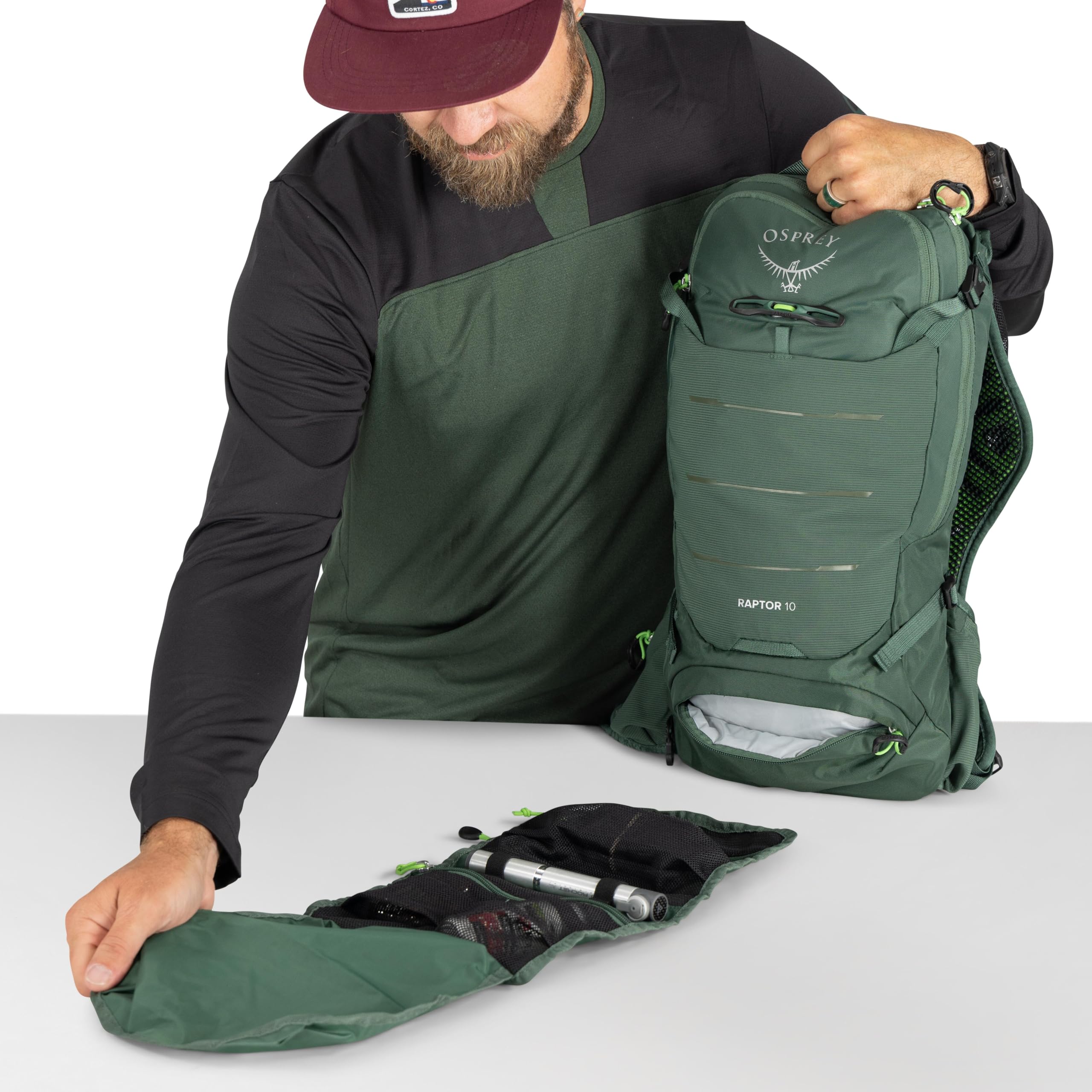 Osprey Raptor 10L stretch front pocket for quick gear stow.