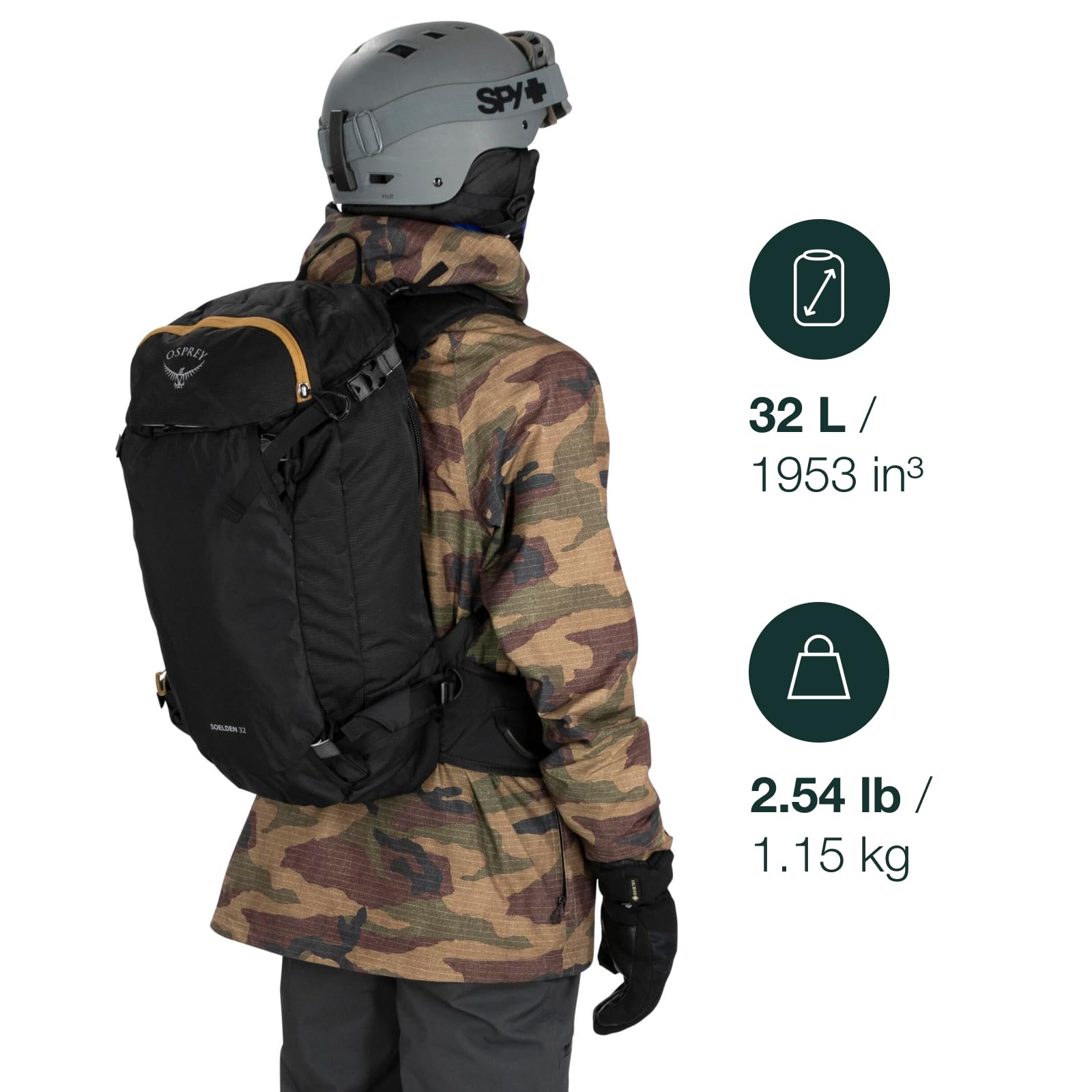 Osprey Soelden 32L backpanel dry storage keeps layers dry on long tours.