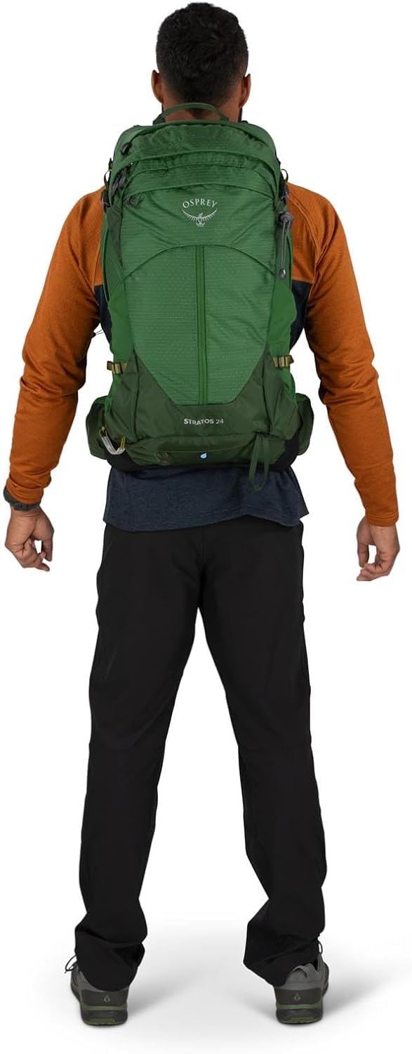 Osprey Stratos 24L trail-use shot showcases rugged, weather-ready daily hiking companion.