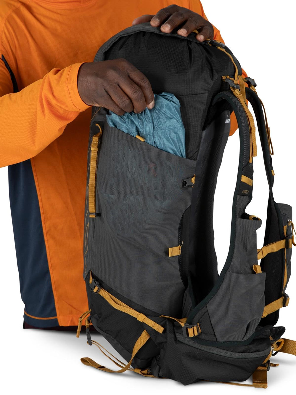 Osprey Talon Velocity 30L matcha green lemongrass colorway in sunlight