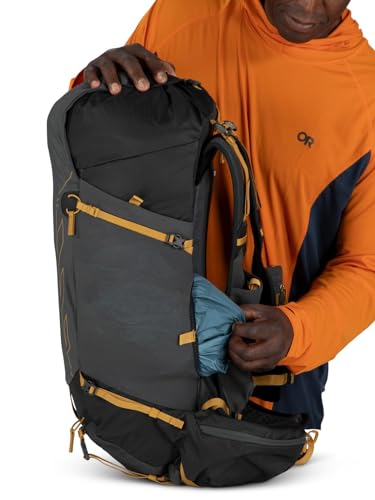Osprey Talon Velocity dark charcoal and tumbleweed colorway outdoors