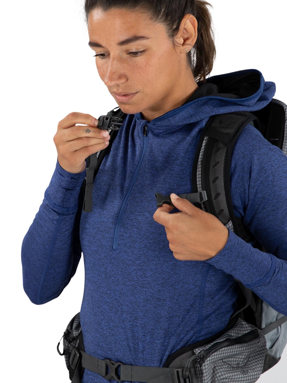 Osprey Tempest Pro 20L stretch pockets for gear organization.