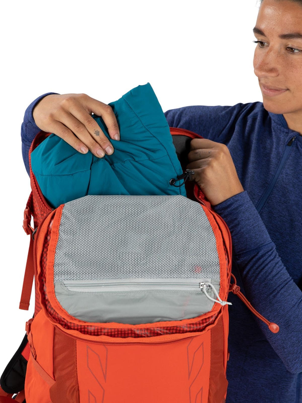 Stretch pockets expanded storage on Osprey Tempest Pro 30L for essentials.