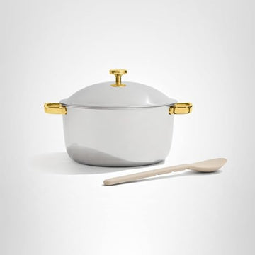 Cool-touch handle on Our Place Titanium Perfect Pot Pro supports safe handling.