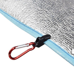 Outanaya tarp clips show a toothed mouth grip for strong hold.