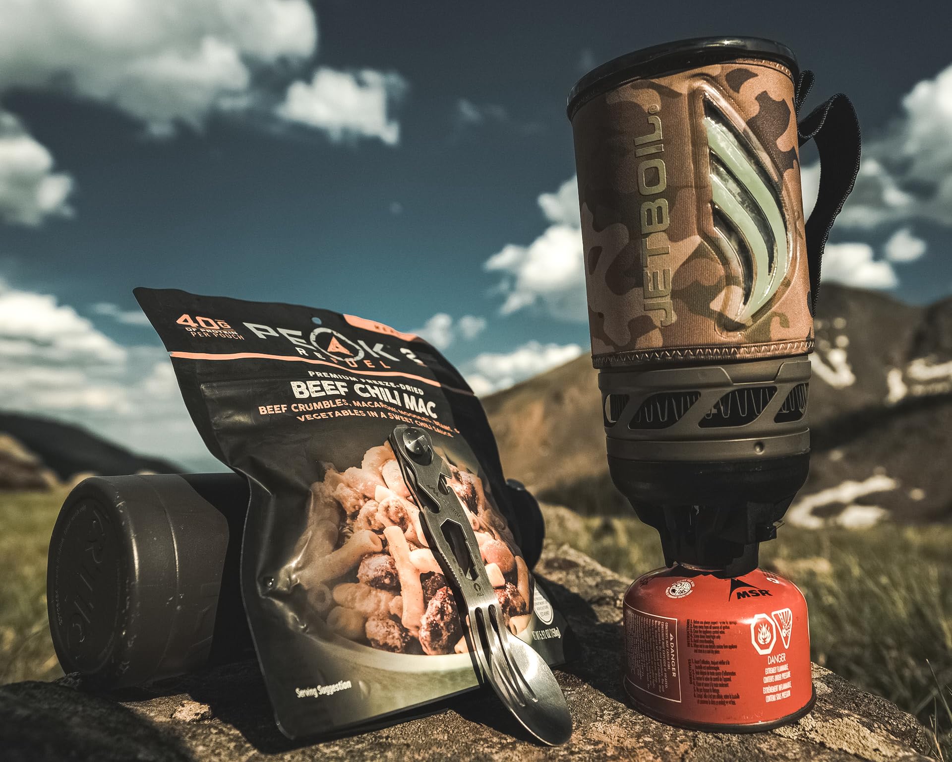 Outdoor Edge Chowlite frame-lock spoon secured during use.