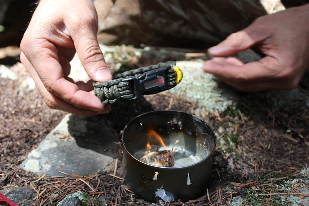 Fishing line and hook included for improvised fishing