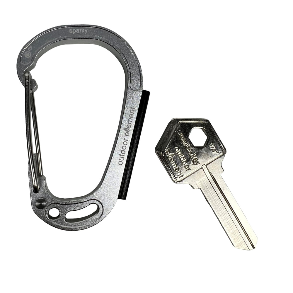Outdoor Element Sparky & Scratch keycarabiner with fire starter for camping.