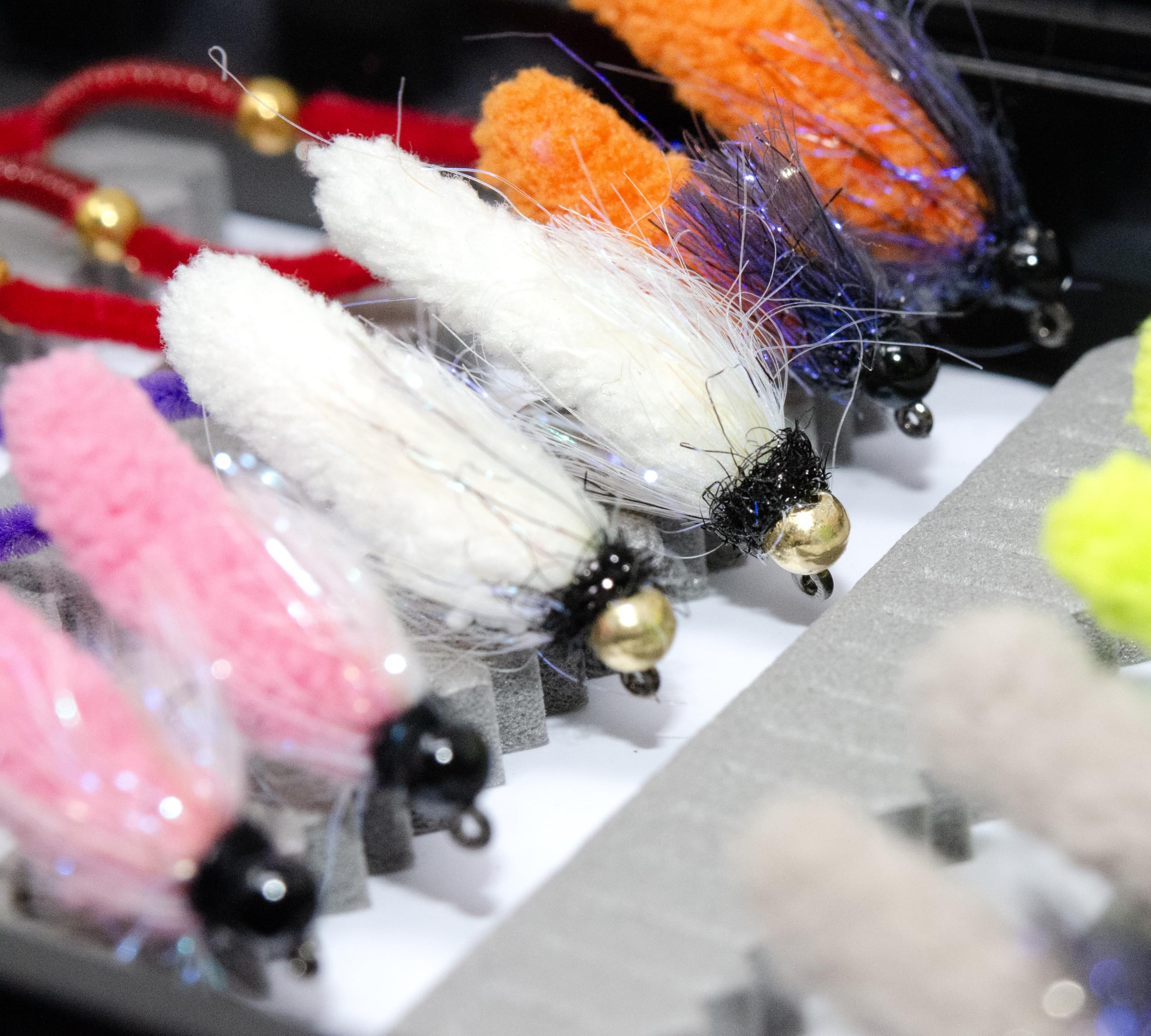 Outdoor Planet Trout Fly Collection in sizes 10-14 for varied water depths.