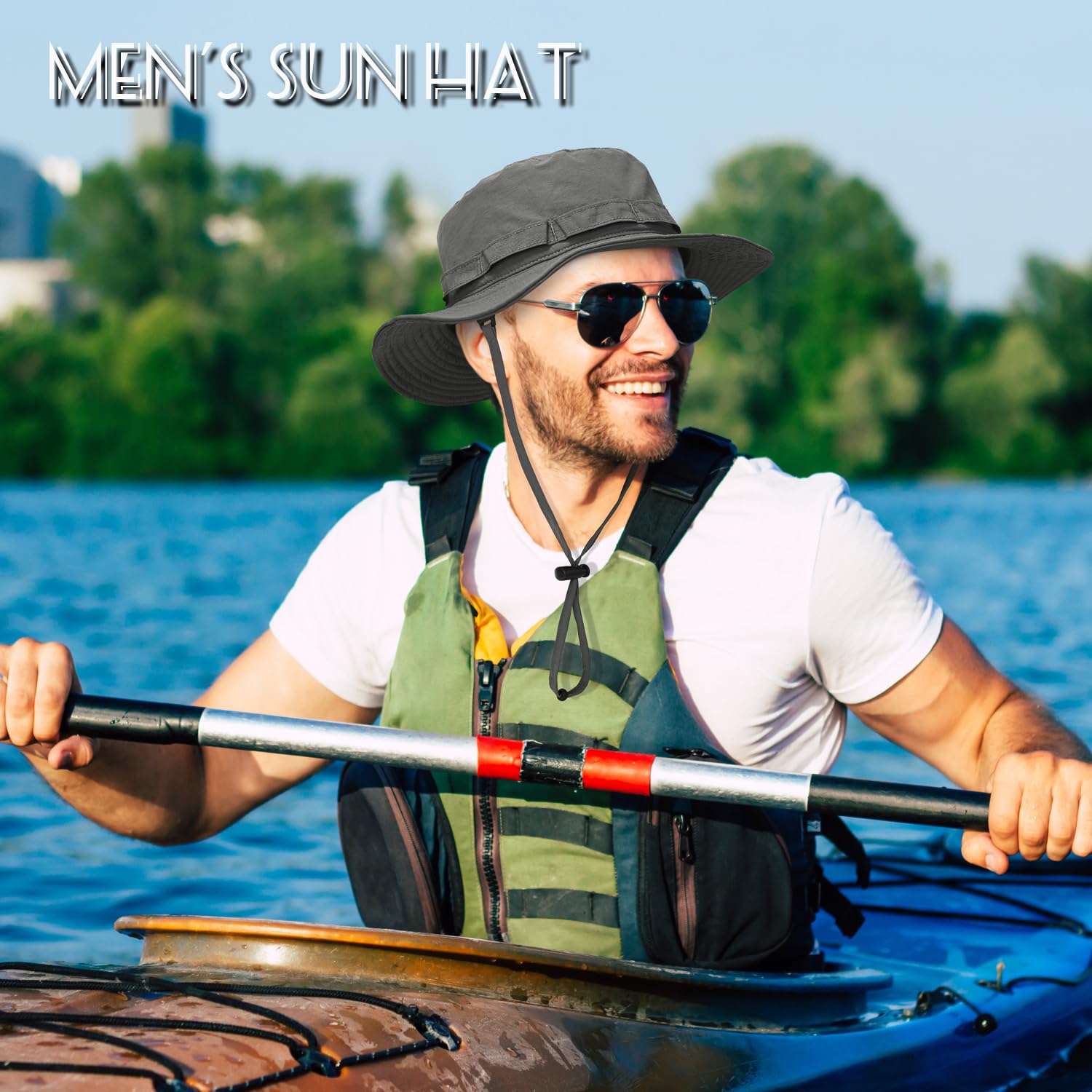 Beach setting with a dark gray sun hat on a man