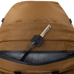 Outdoor Research Adrenaline Day Pack 20L in Coyote, water bottle pocket in use