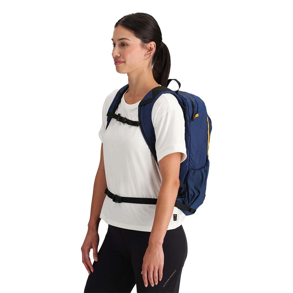 Outdoor Research Adrenaline Day Pack 20L side pocket open for quick access.