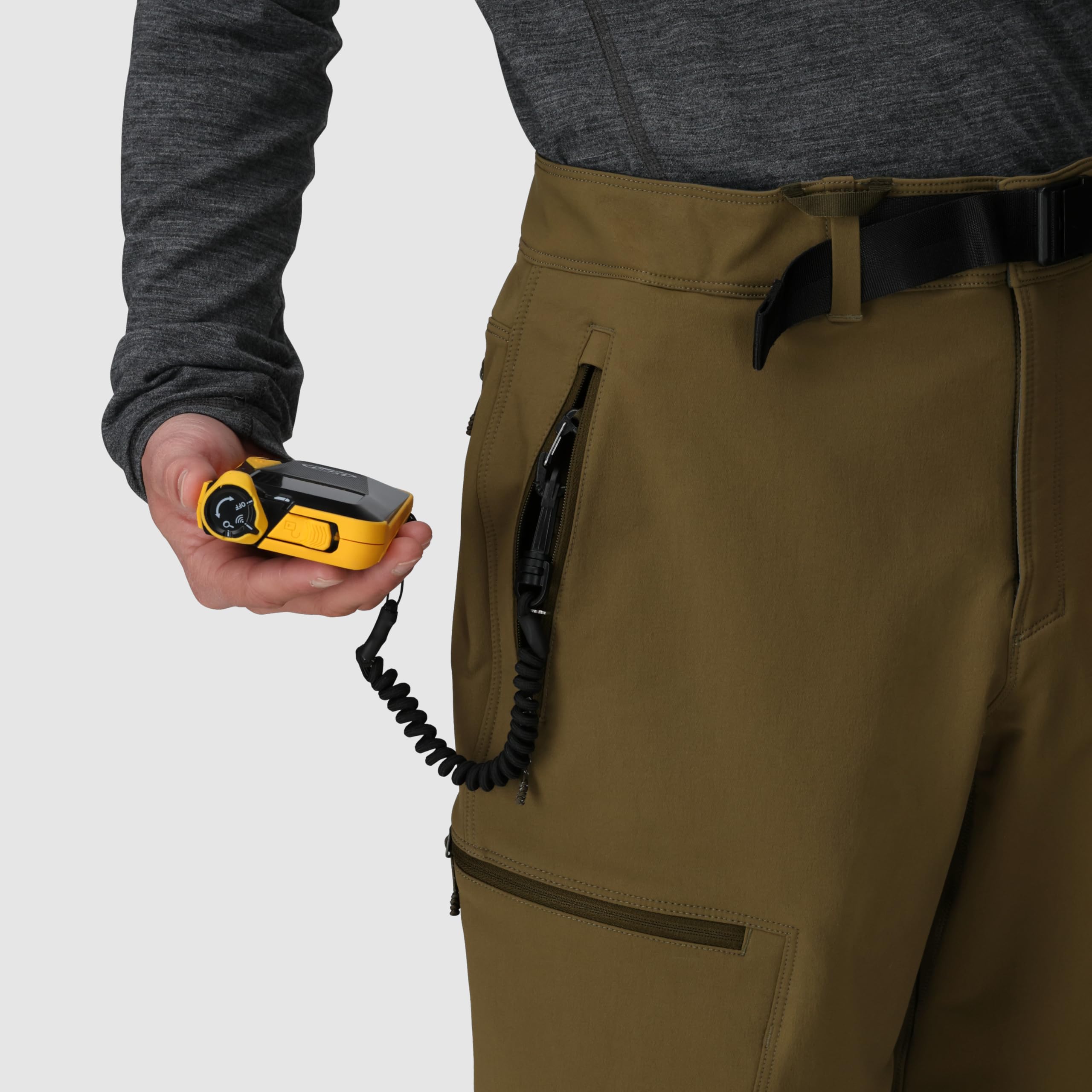 Outdoor Research Cirque III Pants dark olive fabric closeup shows stretch and breathability.