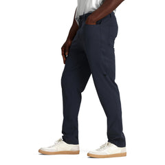 Outdoor Research Ferrosi Transit Pants worn during travel on urban trails.