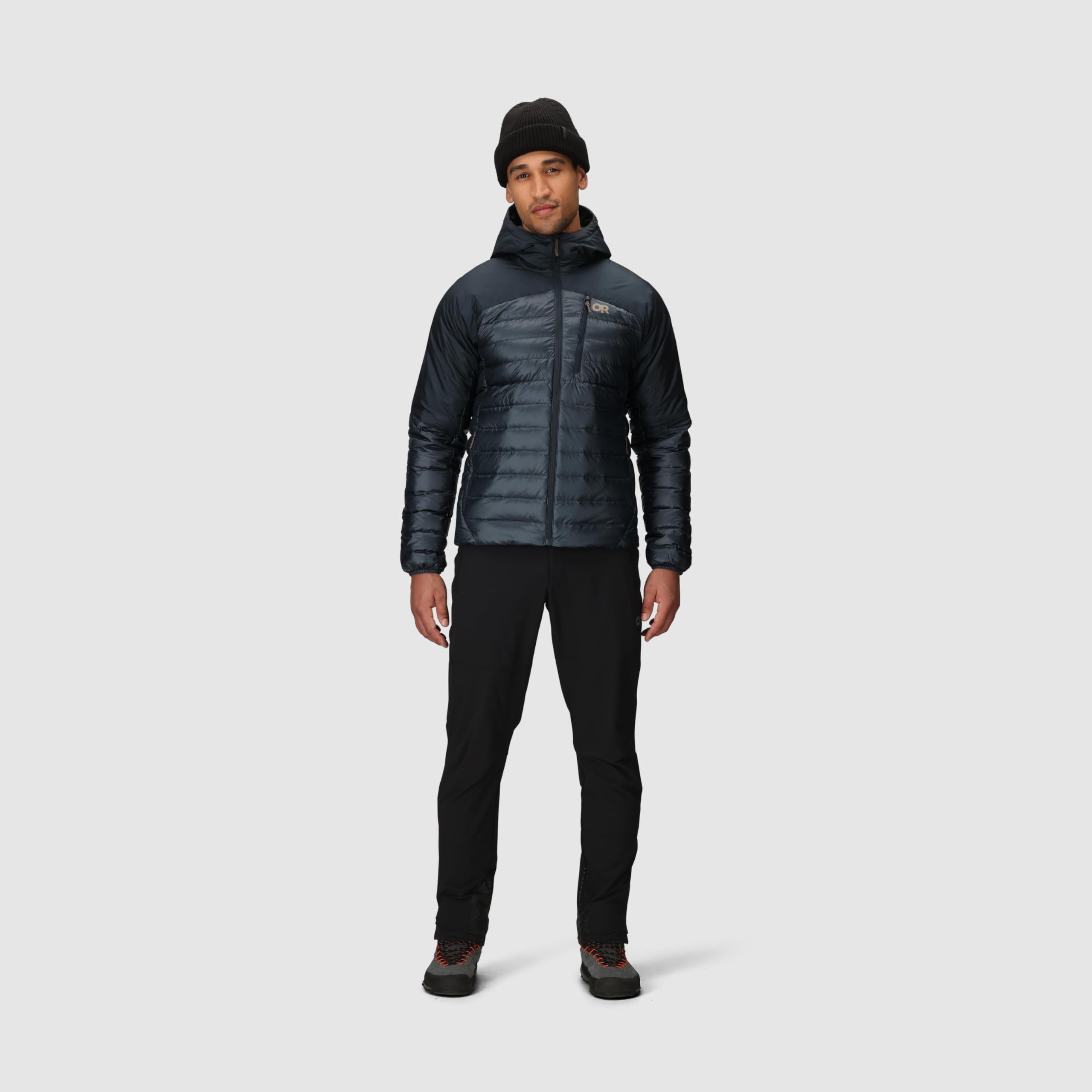 Outdoor Research Helium Down Hoodie Atlantic chest pocket close-up shows quick-access essentials