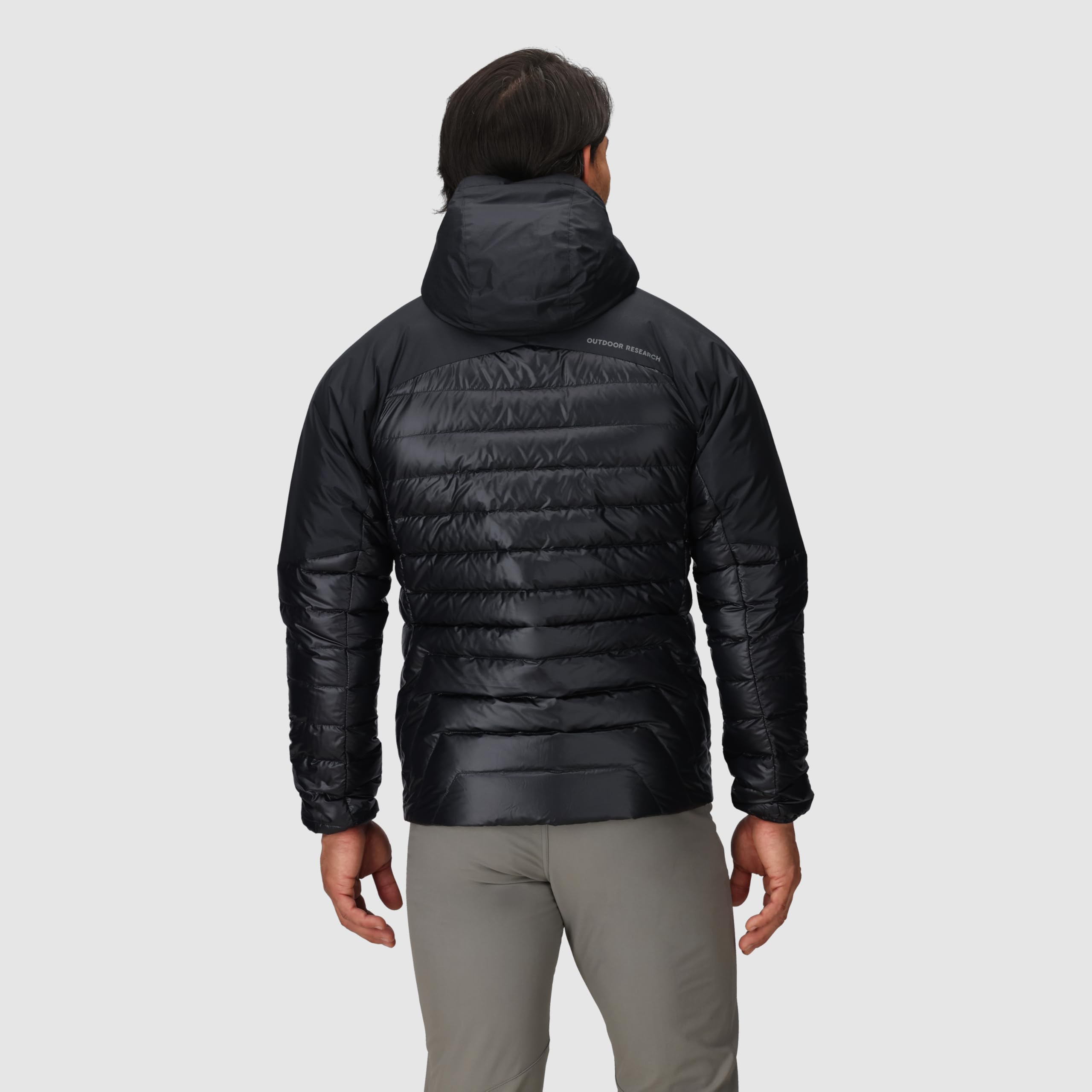 Outdoor Research Helium Down Hoodie interior pocket keeps gloves and electronics warm and secure.