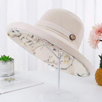 Outdoor beige sun hat being worn on a hike