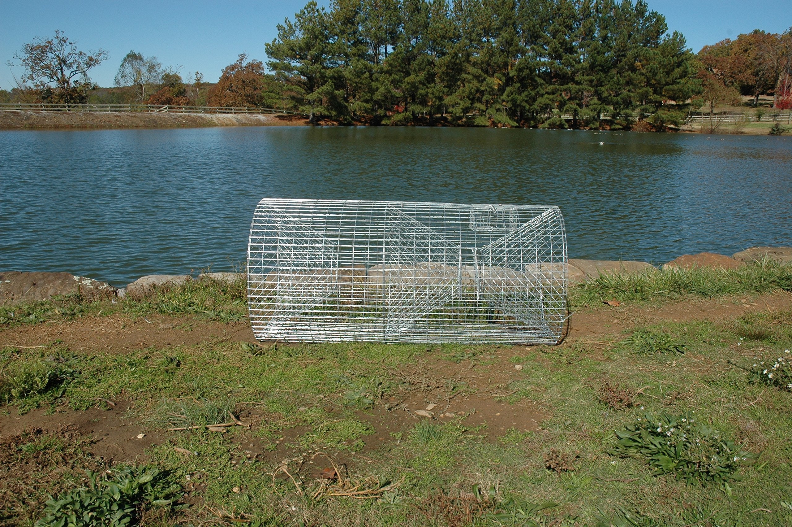 Outdoor Water Solutions Catfish Trap shows built-in bait box for easy baiting.