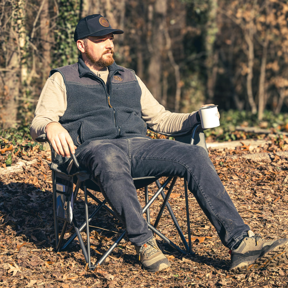 OUTSIDER chair with cup holder and storage pocket keeps drinks and essentials at hand