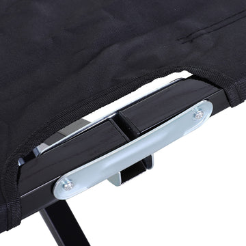 Outsunny black camping cot blends with outdoor gear