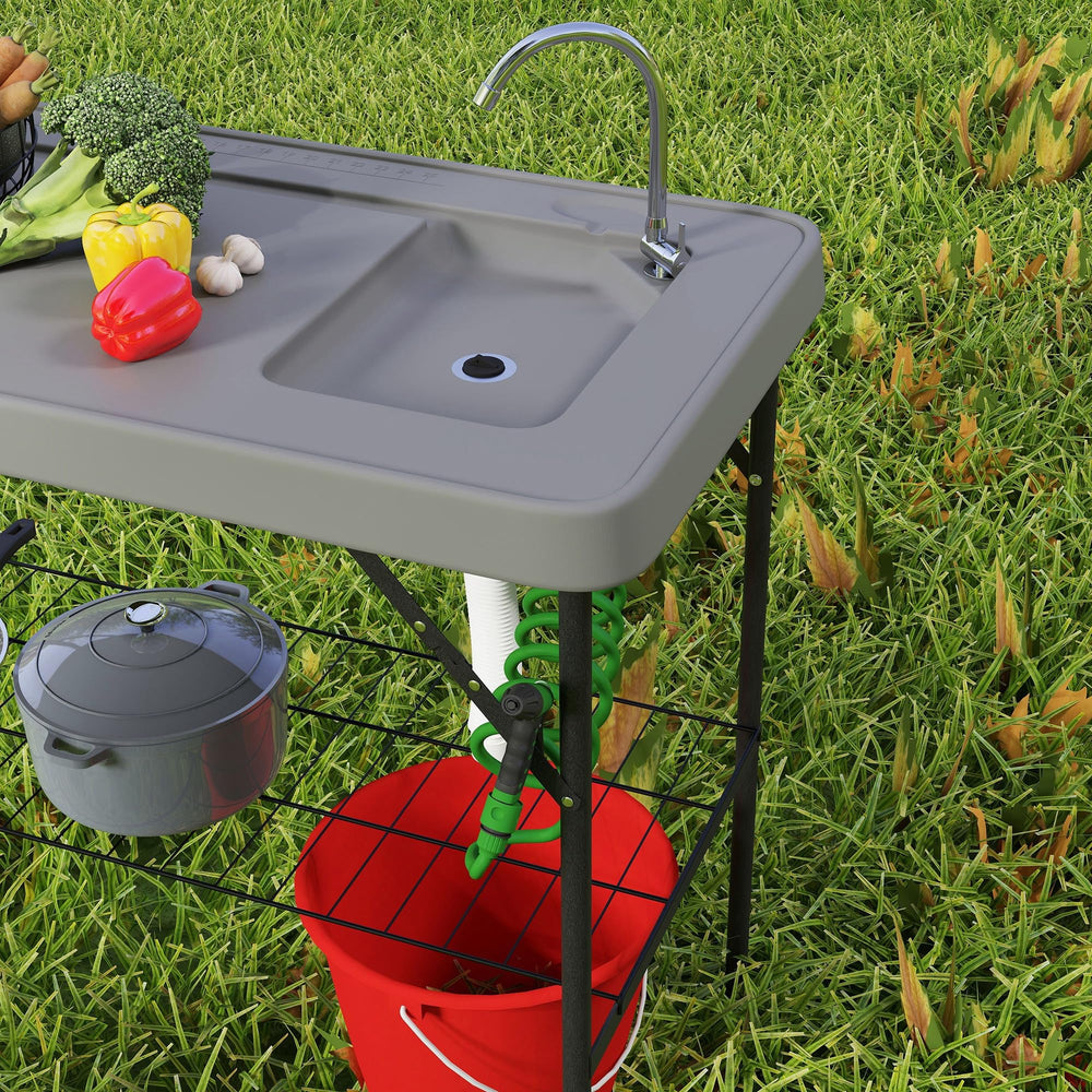 Outsunny compact outdoor table suitable for picnics and fishing trips
