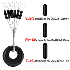 Close-up of black rubber bobber stoppers on fishing line