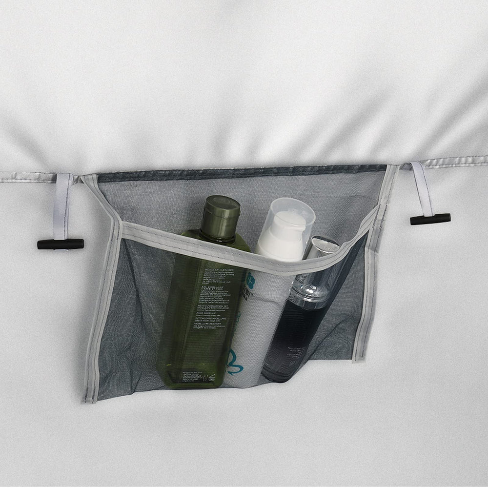 Built-in storage pocket keeps essentials within reach outdoors.