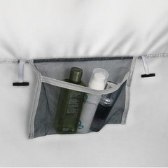 Built-in storage pocket keeps essentials within reach outdoors.