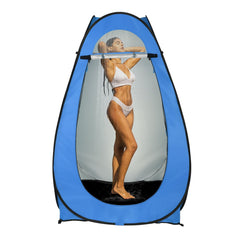 Outvita pop-up shower tent assembled with stakes for stable privacy at a campsite.