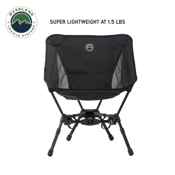 Overland Vehicle Systems Compact Camping Chair with adjustable legs for varied ground heights.