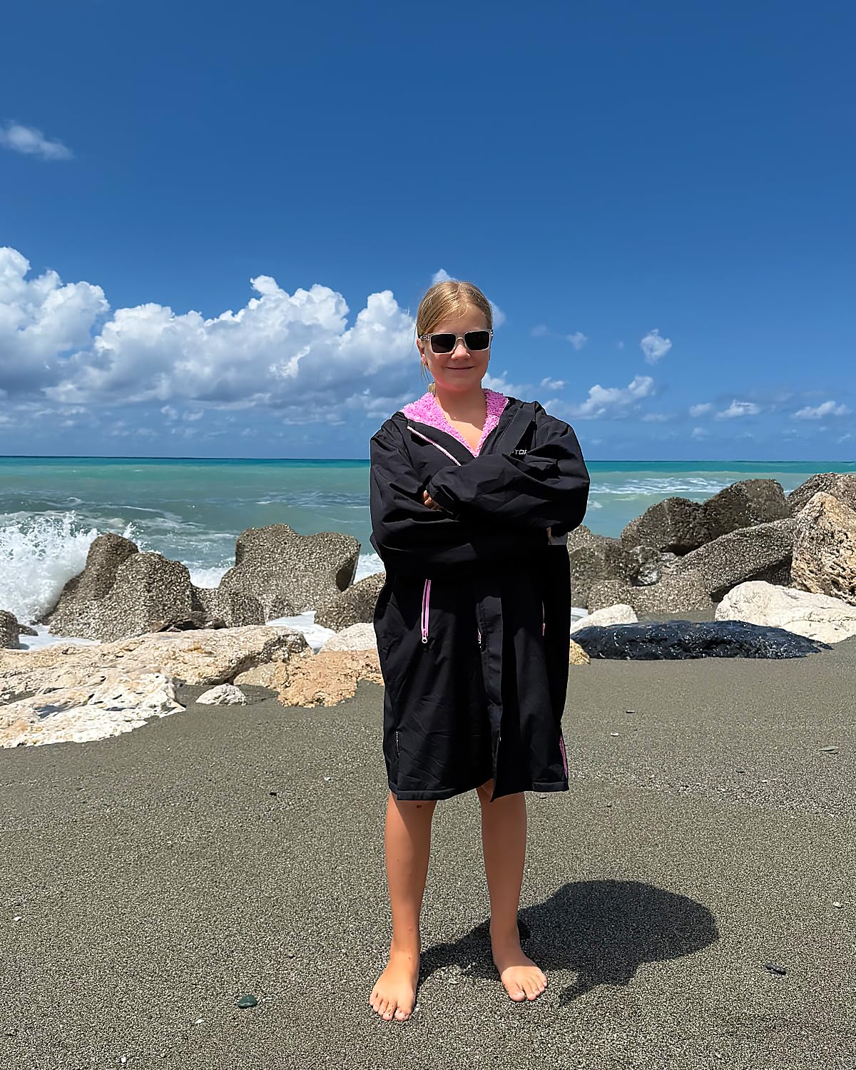 Owntop swim parka worn outdoors illustrates versatile changing coat during activities.
