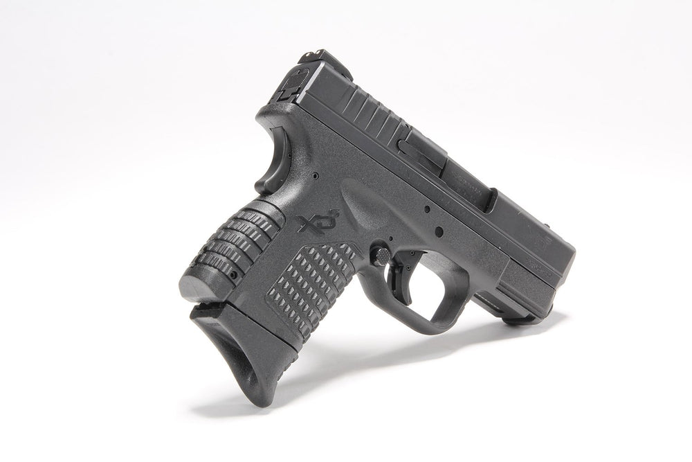 Pachmayr Springfield XD-S grip extender in hand for better handling.