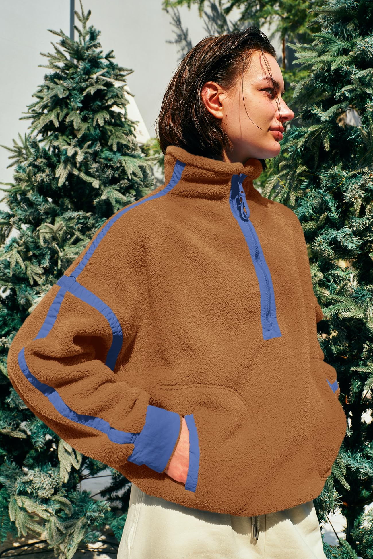 Panadila fleece pullover closeup of zip pockets and plush texture