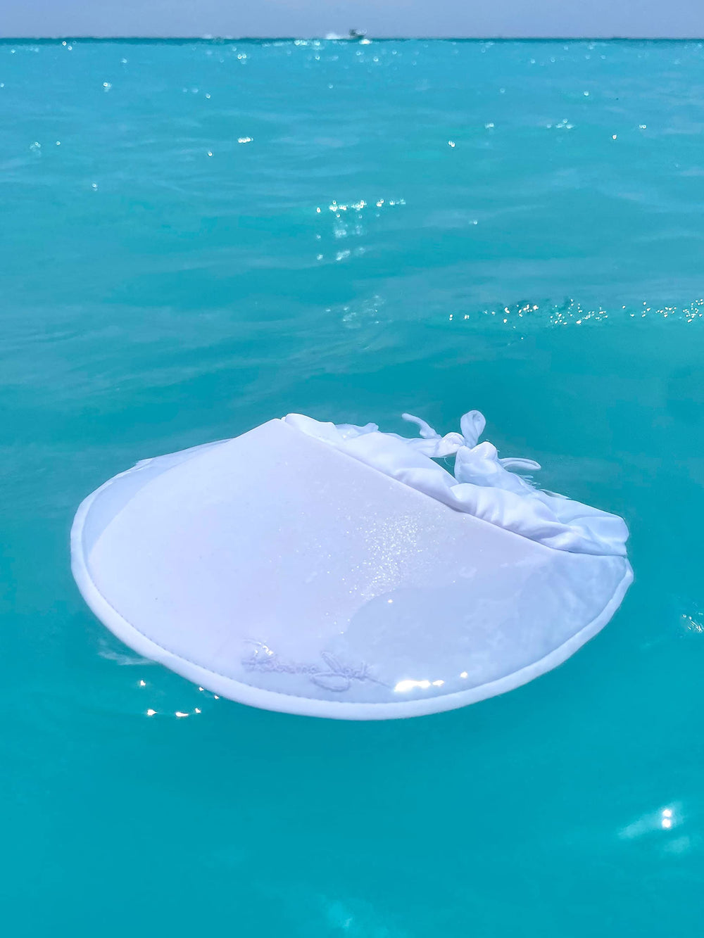 Panama Jack sun visor highlighting UVA/UVB protection in breathable design