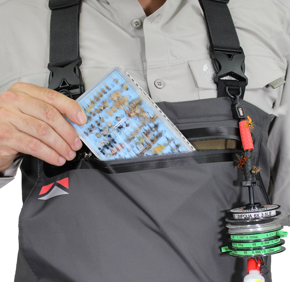 Paramount Outdoors Deep Eddy chest pocket with fleece-lined pass-through for gear access.