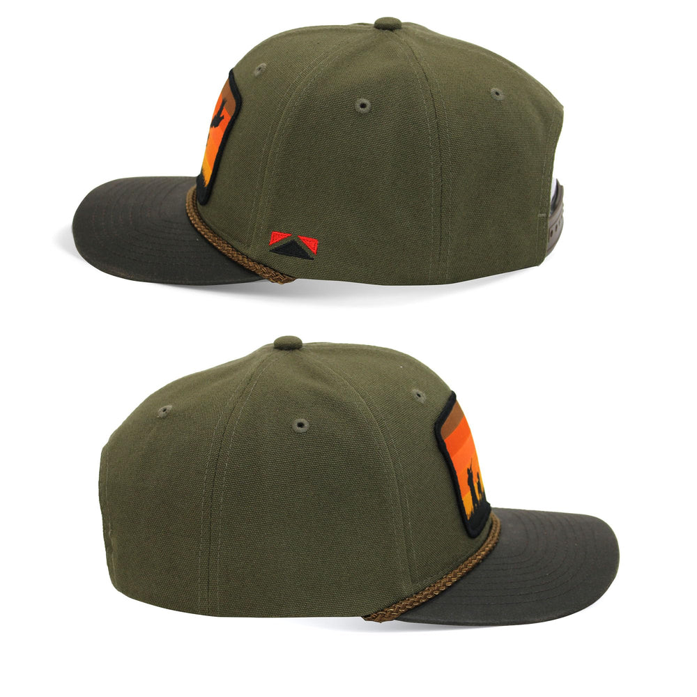 Close-up of wax cloth visor on Paramount Outdoors pheasant-quail hat for weather durability.