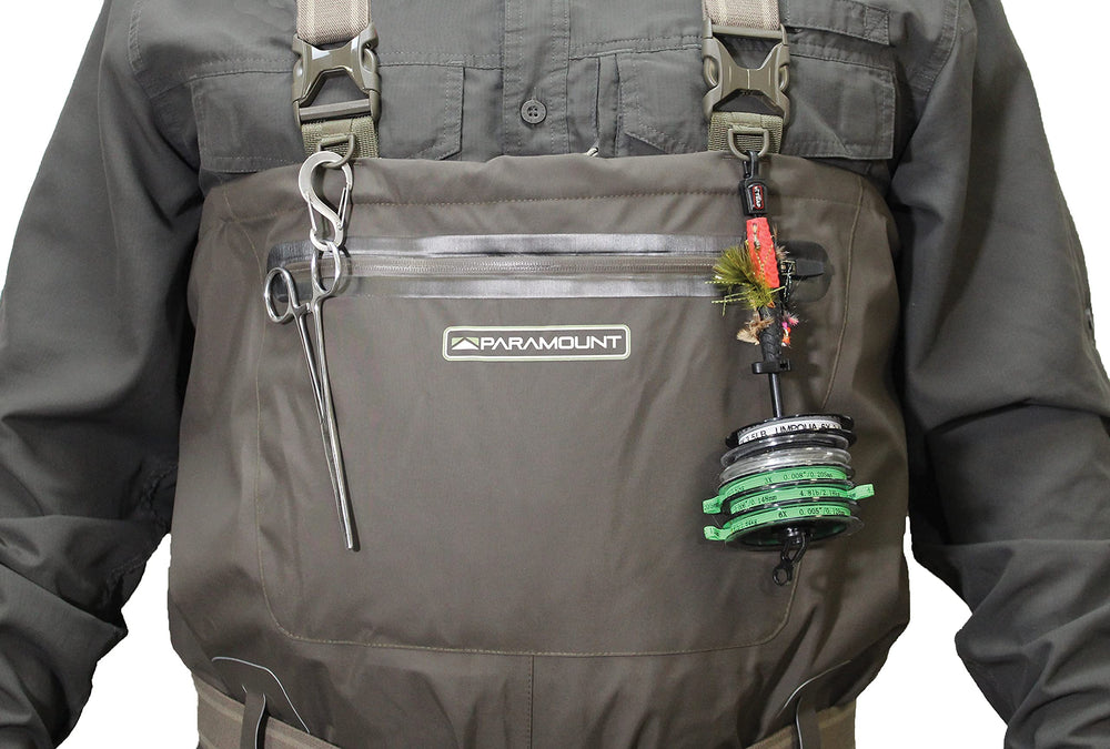 Paramount Outdoors Stonefly Youth Wader warranty card indicates quality assurance.
