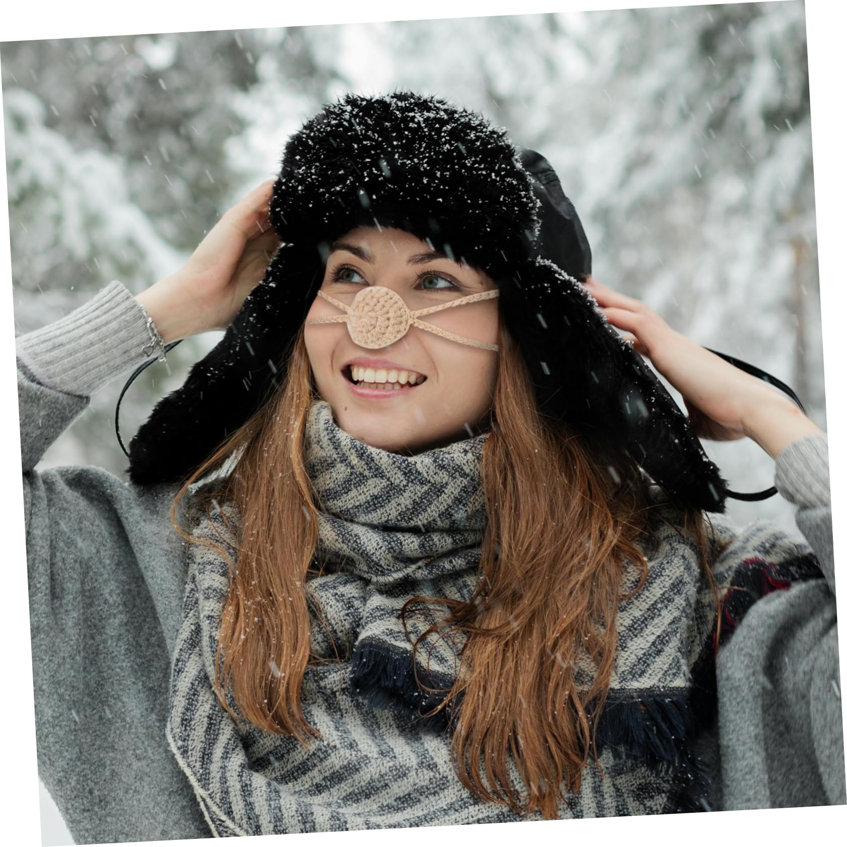 PartyKindom fashionable winter face cover pairs with coats for a stylish look.